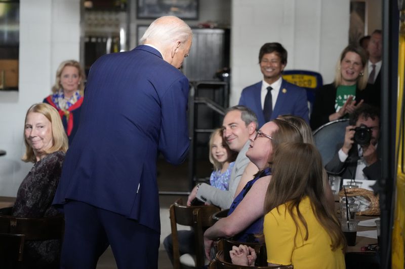 President Joe Biden speaks to supporters at Garage Grill & Fuel Bar during a campaign stop in Northville, Mich., Friday July 12, 2024. (AP Photo/Jacquelyn Martin)