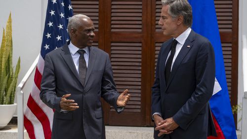 U.S. Secretary of State Antony Blinken, right, and Haitian Prime Minister Garry Conille speak to the press at the U.S. Chief of Mission Residence in Port-au-Prince, Haiti, Thursday, Sept. 5, 2024. (Roberto Schmidt/Pool photo via AP)