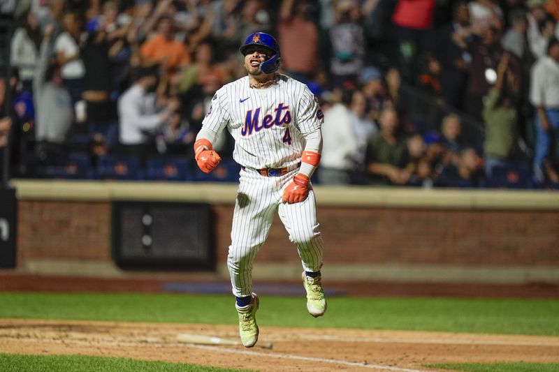 New York Mets' Francisco Alvarez reacts after hitting a walk off home run during the ninth inning of a baseball game against the Baltimore Orioles at Citi Field, Monday, Aug. 19, 2024, in New York. The Mets defeated the Orioles 4-3. (AP Photo/Seth Wenig)