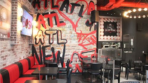 The dining room at BOSK, Atlanta hip-hop entrepreneur Big Oomp's new smashburger restaurant in Southwest Atlanta. (Mike Jordan/AJC)