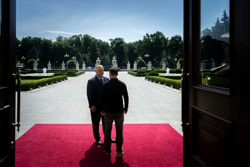 In this photo provided by the Hungarian PM's Press Office, Ukrainian President Volodymyr Zelenskyy, right, welcomes Hungarian Prime Minister Viktor Orban in Kyiv, Ukraine, Tuesday, July 2, 2024. (Zoltan Fischer/Hungarian PM's Press Office/MTI via AP)