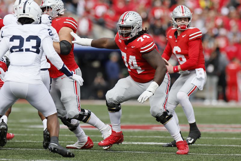 FILE - Ohio State offensive lineman Donovan Jackson (74) plays against Penn State during an NCAA college football game Saturday, Oct. 21, 2023, in Columbus, Ohio. (AP Photo/Jay LaPrete, File)