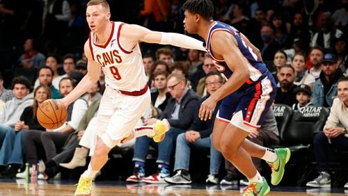 Dylan Windler (9) of the Cleveland Cavaliers dribbles as Cam Thomas (24) of the Brooklyn Nets defends during the second half at Barclays Center in New York City, on April 8, 2022.  (Sarah Stier/Getty Images/TNS)