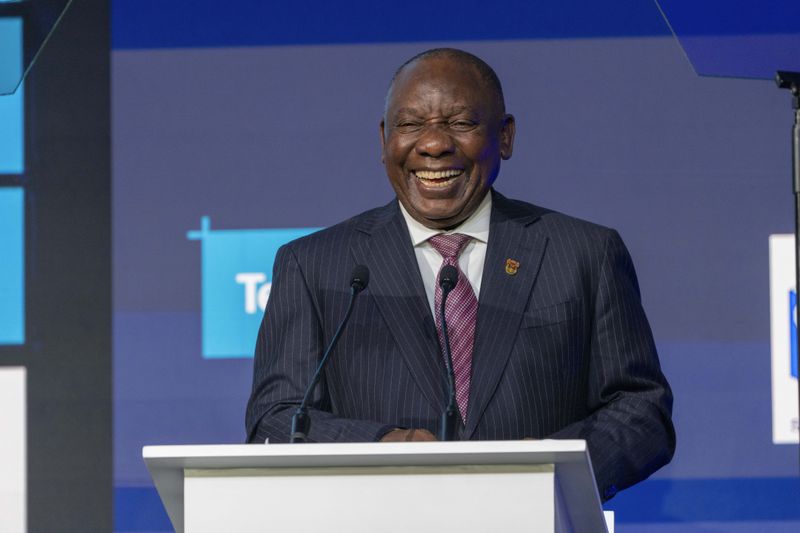 South African President Cyril Ramaphosa tells a joke as he delivers his speech at the formal announcement of the results in South Africa's general elections at the National Results Operations Center in Johannesburg, South Africa, Sunday, June 2, 2024. Humbled by a stinging election result, South Africa's African National Congress was talking to everyone in an effort to form a stable coalition government for Africa's most advanced economy after it lost its 30-year majority. (AP Photo/Jerome Delay)