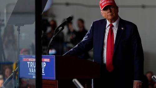 Republican presidential nominee former President Donald Trump speaks during a campaign rally at Dodge County Airport, Sunday, Oct. 6, 2024, in Juneau, Wis. (AP Photo/Julia Demaree Nikhinson)