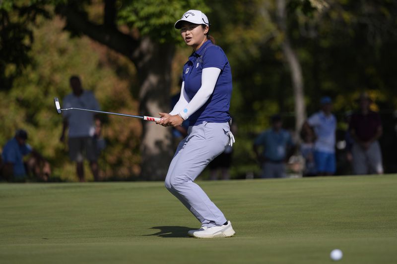 Yan Liu, of China, reacts to missing a putt during the final round of the LPGA Kroger Queen City Championship golf tournament at TPC River's Bend in Maineville, Ohio, Sunday, Sept. 22, 2024, Sunday, Sept. 22. (AP Photo/Carolyn Kaster)