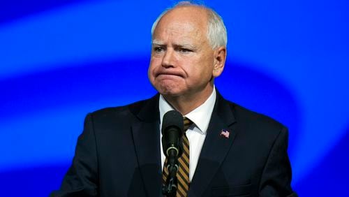 Democratic vice presidential nominee Minnesota Gov. Tim Walz reacts as he speaks at the American Federation of State, County and Municipal Employees (AFSCME) Convention in Los Angeles, Tuesday, Aug. 13, 2024. (AP Photo/Jae C. Hong)