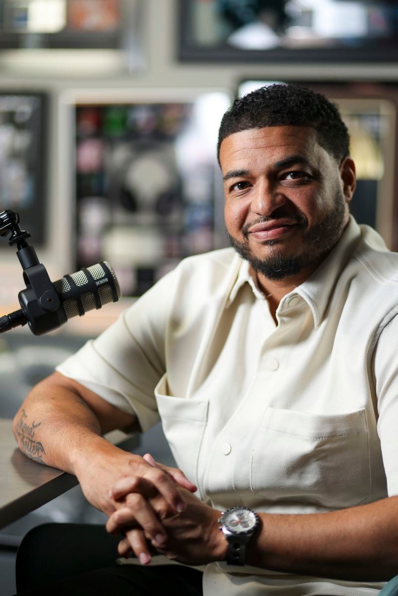 DJ Trendsetter Sense poses in the radio studio of Hot 107.9, Monday, July 1, 2024, in Atlanta. DJ Sense is the host of the new show, Chosen Journey on Hot 107.9. (Jason Getz / AJC)
