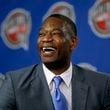 Former NBA basketball player Dikembe Mutombo laughs during a news conference announcing him as one of the 12 finalists of this year's hall of fame class during an event ahead of the NBA All Star basketball game, on Feb. 14, 2015, in New York. (AP Photo/Julio Cortez, File)