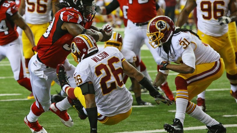 Atlanta Falcons knock Robert Griffin III from game, beat Washington Redskins