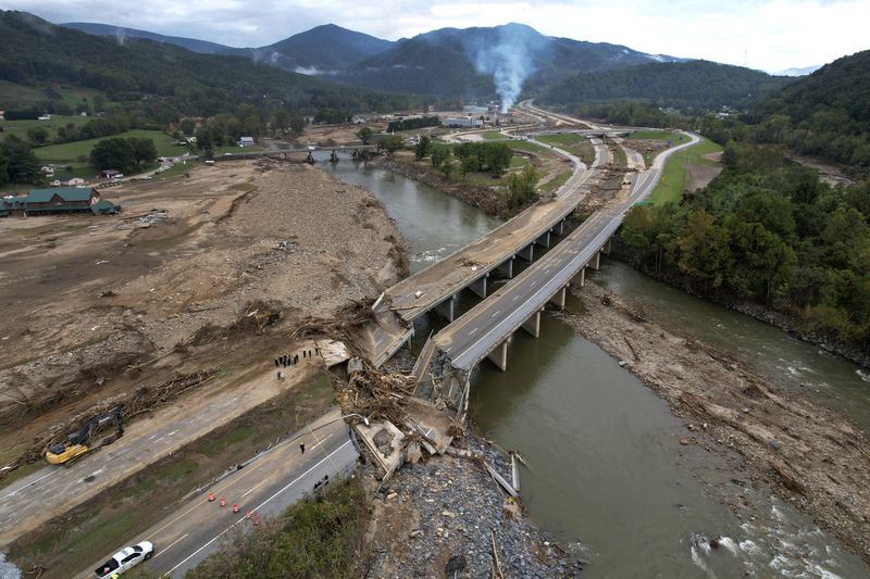 A bridge along Interstate 26 is destroyed in the aftermath of Hurricane Helene Friday, Oct. 4, 2024, in Erwin, Tenn. (AP Photo/Jeff Roberson)