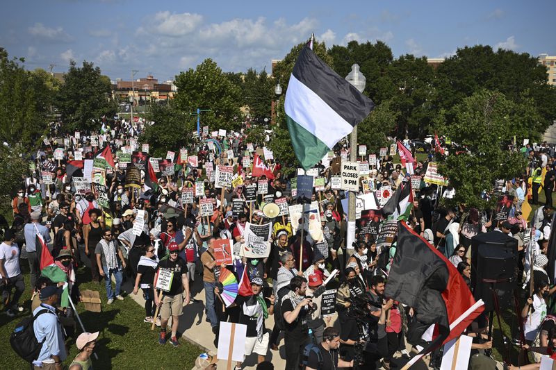 Protesters march to the Democratic National Convention after a rally at Union Park Monday, Aug. 19, 2024, in Chicago. (AP Photo/Noah Berger)