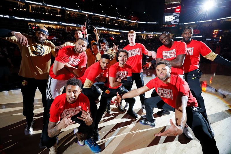 Hawks players pose for a photo after introductions prior to facing the Toronto Raptors at State Farm Arena. (Photo by Kevin C.  Cox/Getty Images)