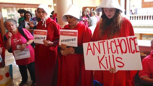 Protesters rally outside a Georgia Senate hearing on an anti-abortion “heartbeat bill.”  AJC/Bob Andres.
