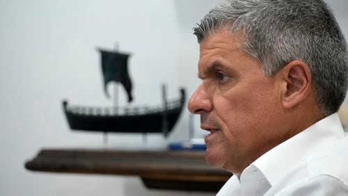 FILE - Cyprus' Energy Minister George Pananastasiou talks during an interview in his office at the Energy Ministry in Nicosia, Cyprus, Thursday July 25, 2024. (AP Photo/Petros Karadjias, File)