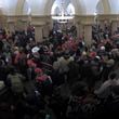 This image from security video of Michael Daniele, a retired New Jersey State Police trooper, seen in the Crypt in the U.S. Capitol on Jan. 6, 2021, was contained in the Justice Department affidavit and complaint in support of the arrest of Daniele. (Department of Justice via AP)