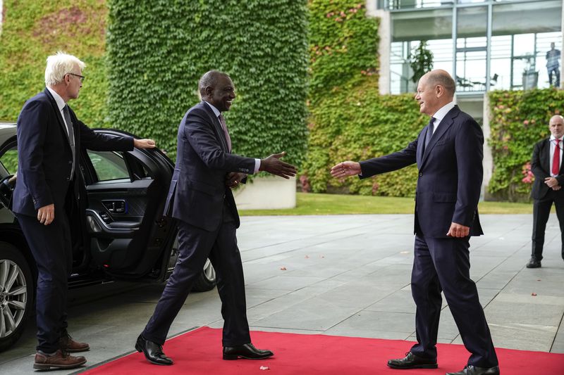 German Chancellor Olaf Scholz, right, welcomes Kenya's President William Ruto at the chancellery in Berlin, Friday, Sept. 13, 2024. (AP Photo/Ebrahim Noroozi)