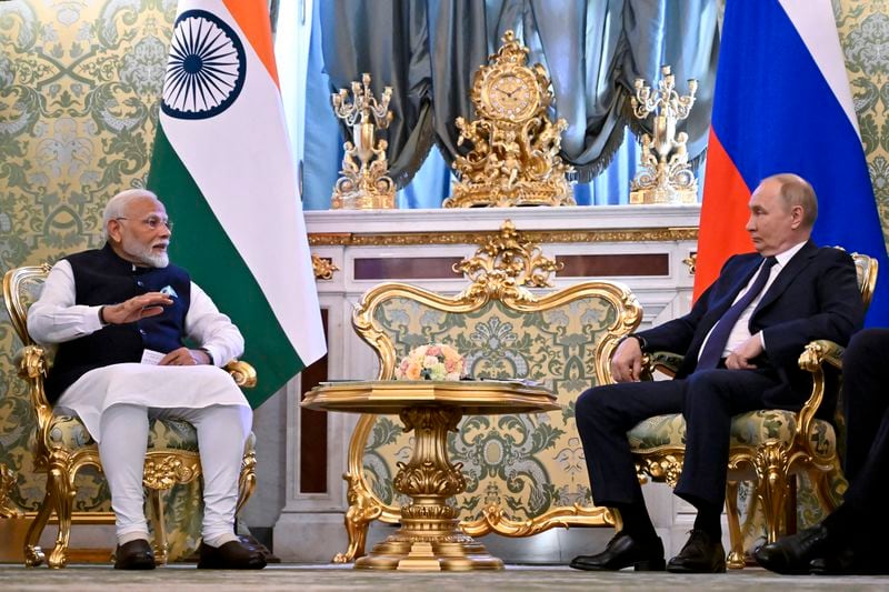 Russian President Vladimir Putin meets with Indian Prime Minister Narendra Modi at the Kremlin in Moscow, Russia, Tuesday, July 9, 2024. (Alexander Nemenov/Pool Photo via AP)