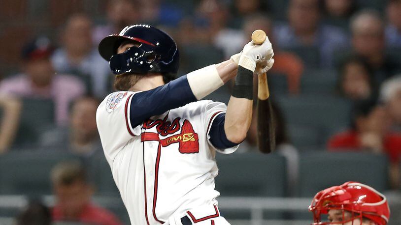 Atlanta Braves shortstop Dansby Swanson (7) hits a home run during