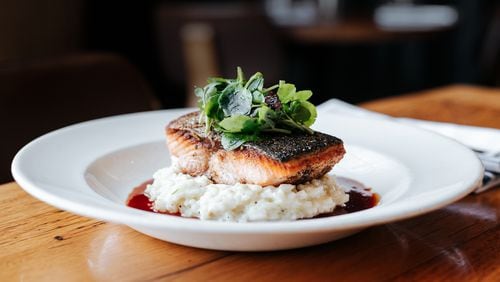 Salmon with creamed fennel and walnut sauce from the menu of Adele's Atlanta.