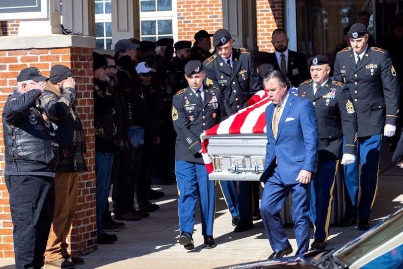 The casket of Staff Sgt. William Jerome Rivers, 46, is carried out of Tabernacle Baptist Church in Carrollton on Feb. 13, 2024. (Arvin Temkar / arvin.temkar@ajc.com)