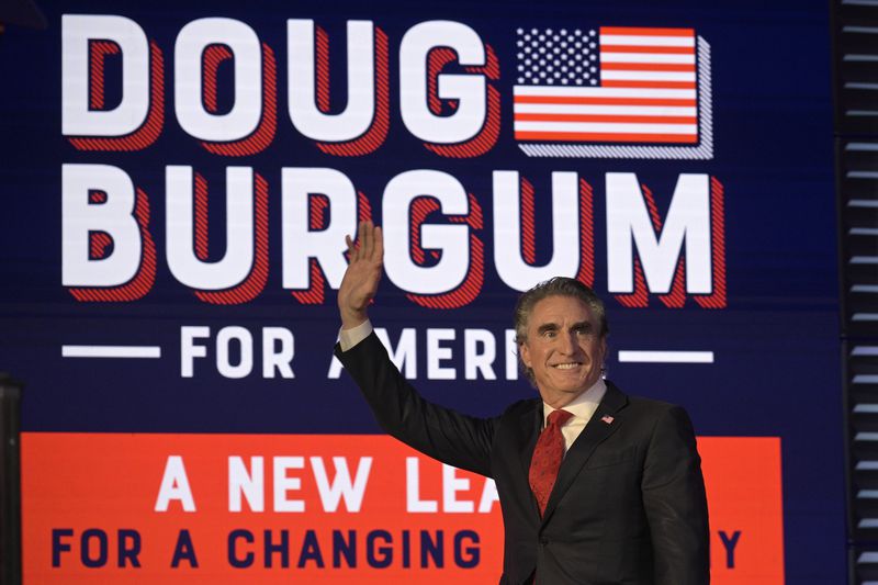 FILE - Republican presidential candidate North Dakota Gov. Doug Burgum addresses attendees at the Republican Party of Florida Freedom Summit, Nov. 4, 2023, in Kissimmee, Fla. (AP Photo/Phelan M. Ebenhack, File)