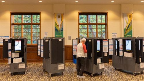 A Fulton County resident votes on primary election day at St. Luke’s Episcopal Church in Atlanta on Tuesday, May 21, 2024. (Arvin Temkar / AJC)