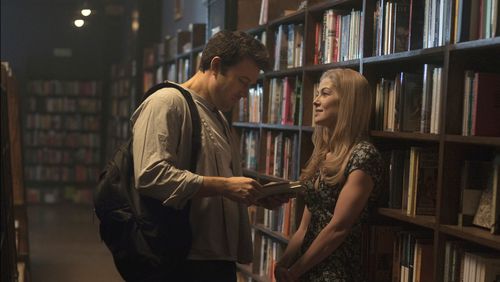 In this image released by 20th Century Fox, Ben Affleck, left, and Rosamund Pike appear in a scene from "Gone Girl." (AP Photo/20th Century Fox, Merrick Morton)