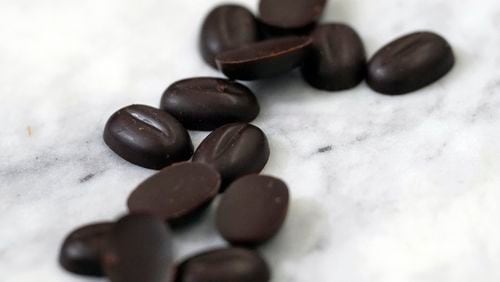 Chocolate callets are displayed at the California Cultured office in West Sacramento, Calif., Wednesday, Aug. 28, 2024. (AP Photo/Jeff Chiu)