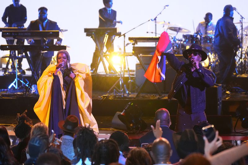 Lauryn Hill, left, and Wyclef Jean perform during the BET Awards on Sunday, June 30, 2024, at the Peacock Theater in Los Angeles. (AP Photo/Chris Pizzello)