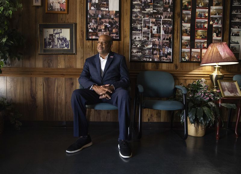 Mayor William D. Rawls Jr., the first Black mayor of Brownsville, Tenn., sits for a portrait on July 10, 2024, in the lobby of the Rawls Funeral Home, founded by his grandfather. Elected to office in 2014, he started the Healthy Moves Initiative, a health education and preventive care effort. (Ariel J. Cobbert/Capital B, CatchLight Local via AP)