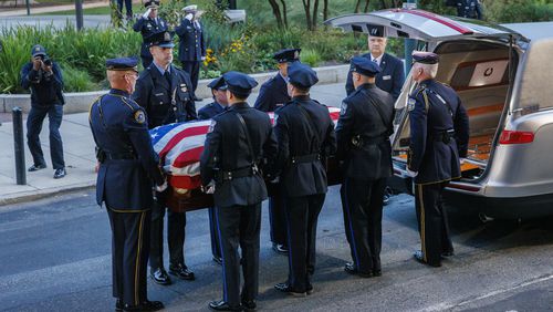 Pallbearers prepare to carry body of fallen Philadelphia police officer Jaime Roman into the Cathedral Basilica of Saints Peter and Paul on Thursday, Sept. 19, 2024. (Alejandro A. Alvarez/The Philadelphia Inquirer via AP)