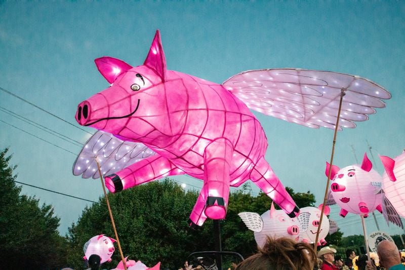 A pig with wings is not something you see every day, but this is just one of the artistic lanterns swinging brightly at the Sandy Springs Lantern Parade.