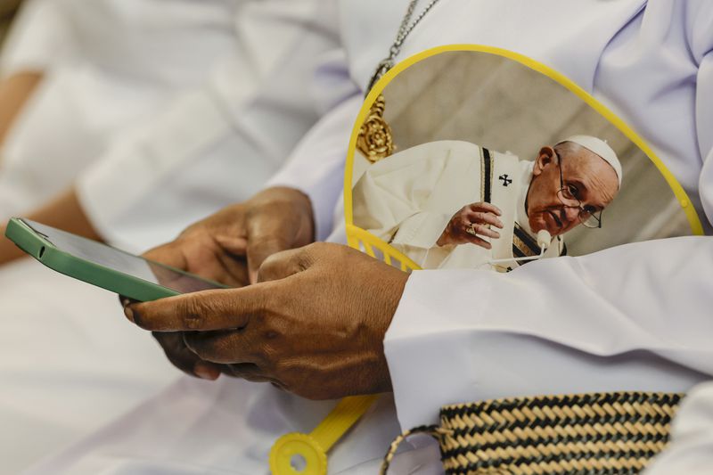 Nuns wait for the arrival of Pope Francis at the Cathedral of Our Lady of the Assumption in Jakarta Wednesday, Sept. 4, 2024. (Yasuyoshi Chiba/Pool Photo via AP)