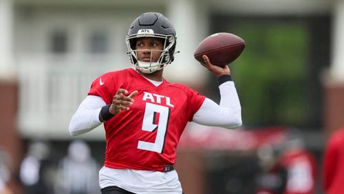 Atlanta Falcons quarterback Michael Penix (9) attempts a pass during minicamp at the Atlanta Falcons Training Camp, Tuesday, May 14, 2024, in Flowery Branch, Ga. (Jason Getz / AJC)
