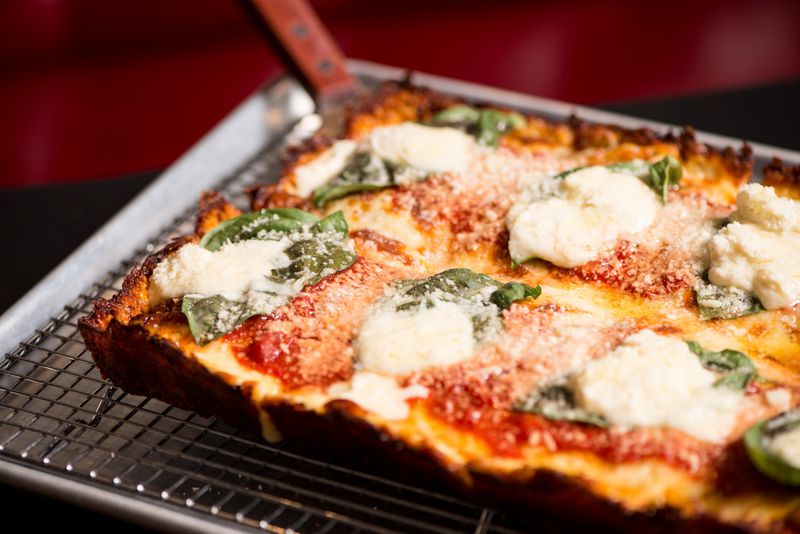 Nina & Rafi’s Margherita in Detroit is a Detroit pie made as the Super Margherita. CONTRIBUTED BY MIA YAKEL