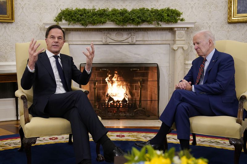 FILE - President Joe Biden meets with Dutch Prime Minister Mark Rutte in the Oval Office of the White House in Washington, Tuesday, Jan. 17, 2023. Over the course of more than a dozen years at the top of Dutch politics, Mark Rutte got to know a thing or two about finding consensus among fractious coalition partners. Now he's going to bring the experience of leading four Dutch multiparty governments to the international stage as NATO's new secretary general. (AP Photo/Carolyn Kaster, File)