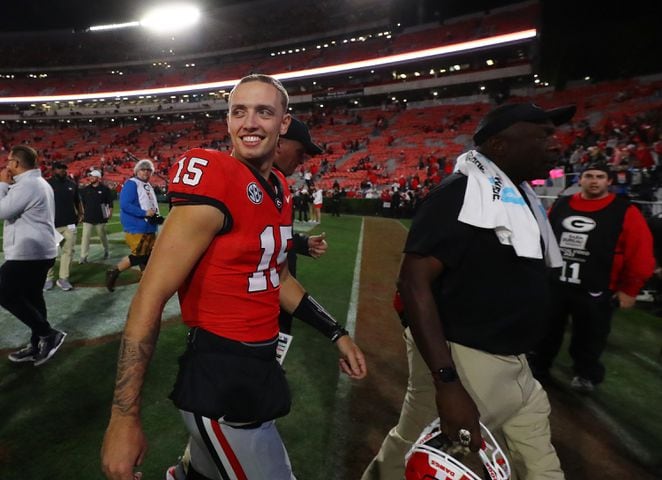 Georgia quarterback Carson Beck is all smiles walking off the field after beating Kentucky 51-13 in a NCAA college football game on Saturday, Oct. 7, 2023, in Athens.  Curtis Compton for the Atlanta Journal Constitution