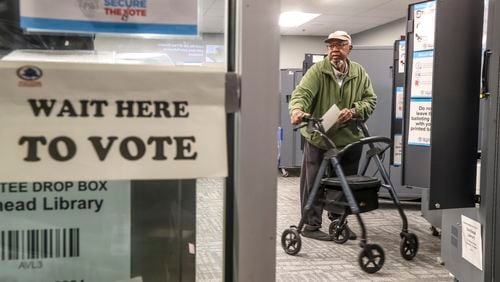 A new Atlanta Journal-Constitution survey offers insights into how Georgia voters plan to cast their ballots in November. (John Spink / AJC file photo)