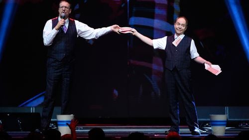 LAS VEGAS, NV - DECEMBER 01:  Penn Jillette (L) and Teller of the comedy/magic team Penn & Teller perform at the Vegas Strong Benefit Concert at T-Mobile Arena to support victims of the October 1 tragedy on the Las Vegas Strip on December 1, 2017 in Las Vegas, Nevada.  (Photo by David Becker/Getty Images)