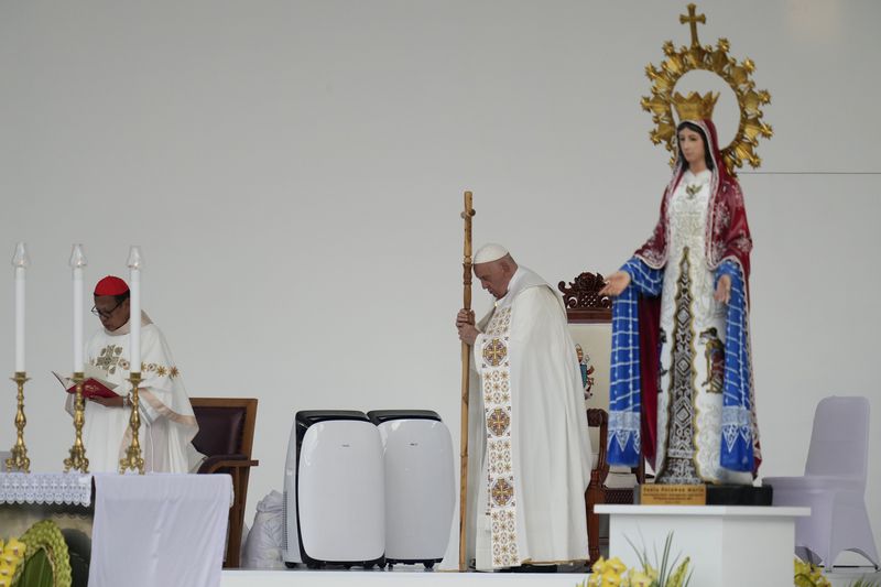 Pope Francis leads the holy mass at Gelora Bung Karno Stadium in Jakarta, Indonesia, Thursday, Sept. 5, 2024. (AP Photo/Achmad Ibrahim, Pool)