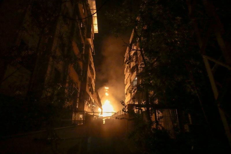 A fire burns at the site of an Israeli airstrike in Beirut's southern suburbs Friday, Sept. 27, 2024. (AP Photo/Bilal Hussein)