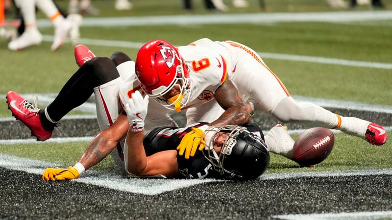 Atlanta Falcons wide receiver Drake London (5) misses the catch in the end zone against Kansas City Chiefs safety Bryan Cook (6) during the second half of an NFL football game, Sunday, Sept. 22, 2024, in Atlanta. (AP Photo/Brynn Anderson)