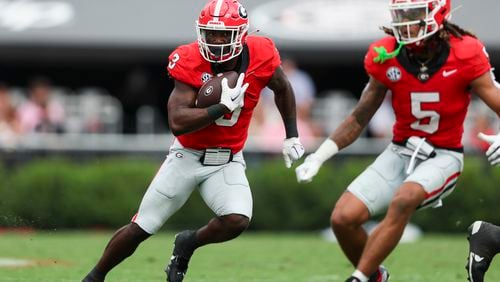 Georgia running back Nate Frazier (3) runs for yards during the second half against Tennessee Tech at Sanford Stadium, Saturday, Sept. 7, 2024, in Athens, Ga. Georgia won 48-3. (Jason Getz / AJC)

