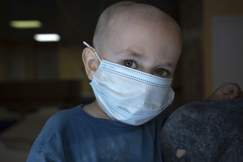 Dmytro, 2, is pictured at the National Cancer Institute in Kyiv, Ukraine, Wednesday, July 10, 2024. Dmytro is one of 31 young patients battling cancer who were relocated to the hospital from Okhmatdyt Children’s Hospital after it was struck by a Russian missile this week. (AP Photo/Alex Babenko)