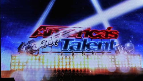 America's Got Talent Live! : The All Stars Tour logo captured on the big screen onstage during opening night on October 6, 2015 in Salina, Kansas. A contestant on the new season, Brandon Rogers, has died in a car crash, before getting the chance to see  his performance episode air.