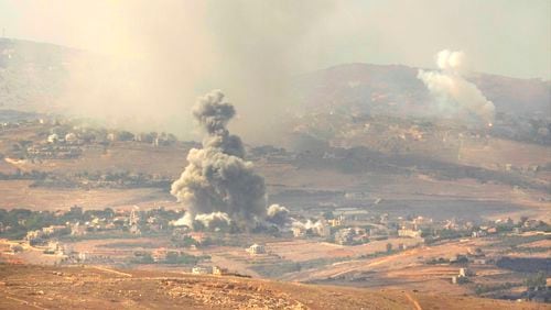 Smoke rises from an Israeli airstrike on the Mahmoudieh mountain, as seen from Marjayoun town, south Lebanon, Tuesday, Sept. 24, 2024. (AP Photo/Hussein Malla)