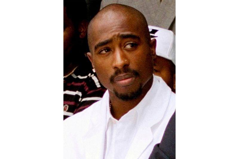 FILE - Rapper Tupac Shakur attends a voter registration event in South Central Los Angeles, Aug. 15, 1996. (AP Photo/Frank Wiese, File)