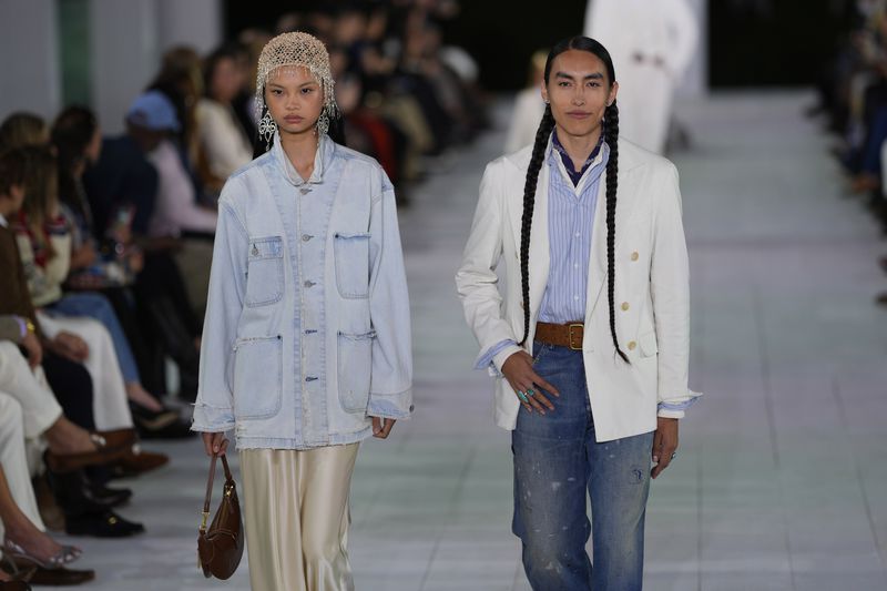 Models walk the runway during the Ralph Lauren Spring/Summer 2025 fashion show as part of New York Fashion Week on Thursday, Sept. 5, 2024, at Khalily Stables in Bridgehampton, N.Y. (Photo by Charles Sykes/Invision/AP)