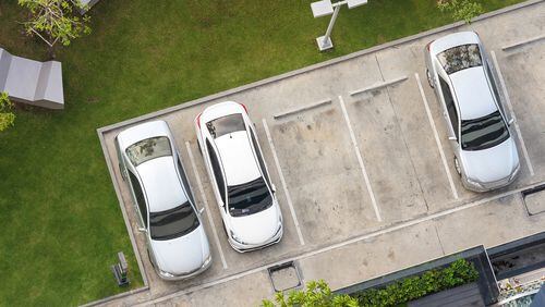 Whether bundled into rent or purchase price, parking is costly. (Dreamstime/TNS)